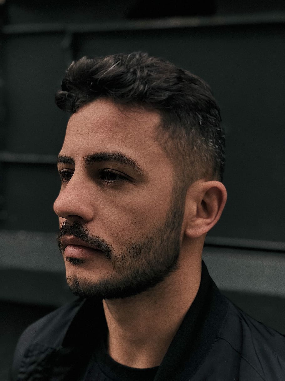 man in black collared top, man in black top, face, portrait, beard HD wallpaper