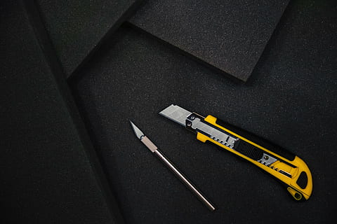 yellow utility knife on black mat, tools, cutting, constructing HD wallpaper