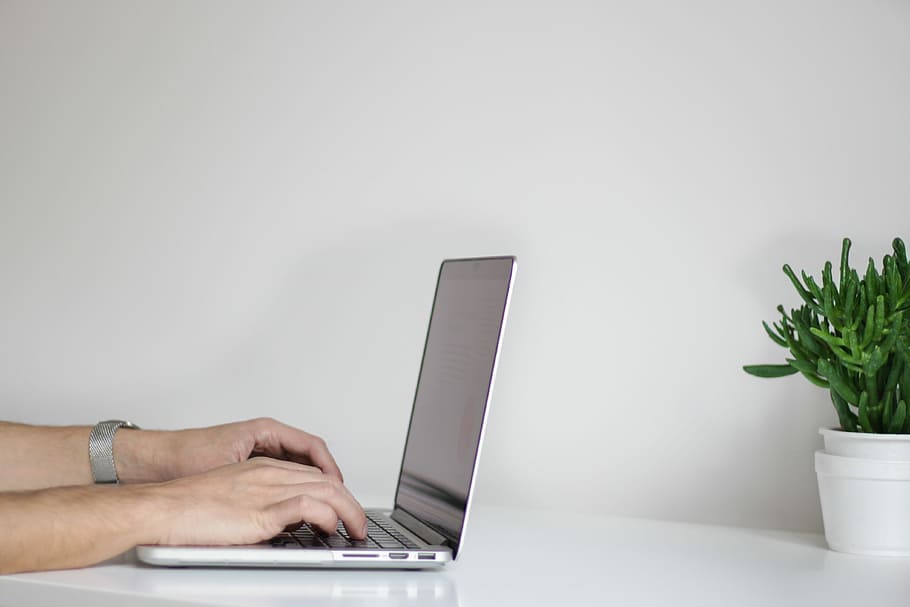 person using laptop, person using gray laptop computer, white HD wallpaper