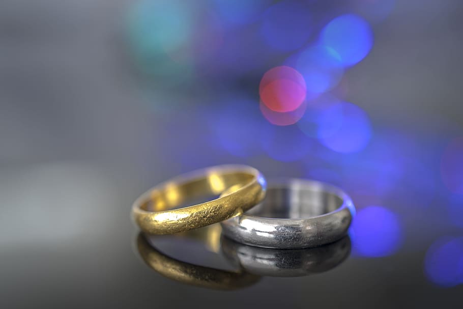 two gold and silver wedding bands, engagement, bokeh, love, pair