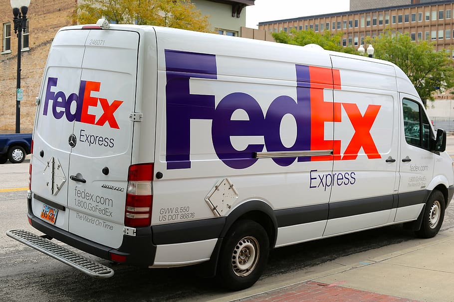 Hd Wallpaper White Fedex Delivery Van Parked On Roadside Near Building At Daytime Wallpaper Flare
