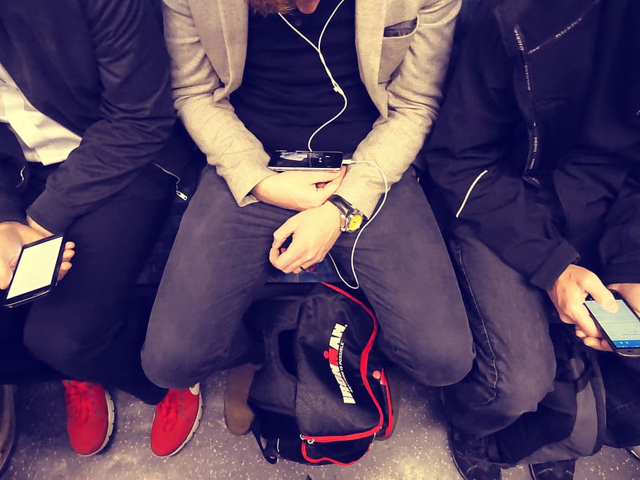 hands, people, men, sitting, backpack, cellphone, earphones, human HD wallpaper