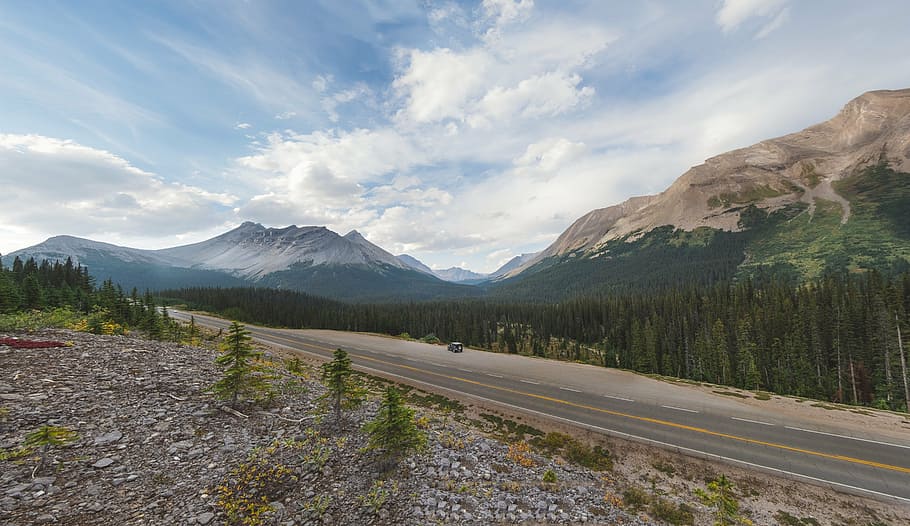 empty road in front of mountain during daytime, highland, clouds HD wallpaper