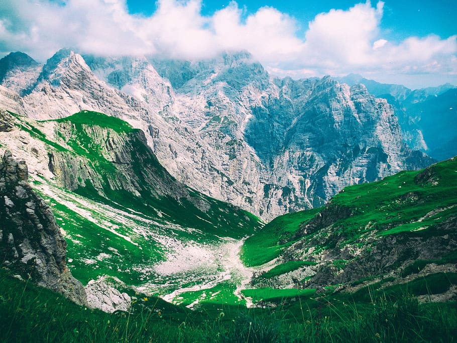 landscape photography of mountains under cloudy sky, valley HD wallpaper