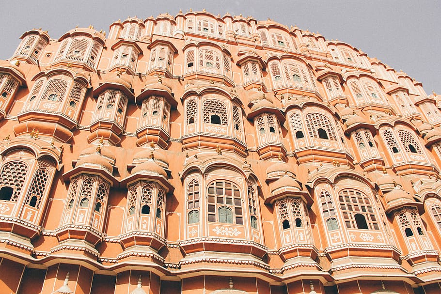 low angle photo of beige concrete building, orange building, architecture HD wallpaper