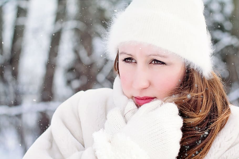 women in white beanie cap and coat portrait photography on snow terrain HD wallpaper