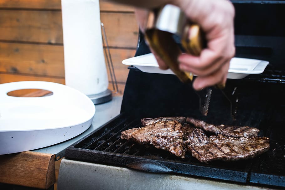 Beef steaks barbeque, cooking, grilling, hands, meat, outside HD wallpaper