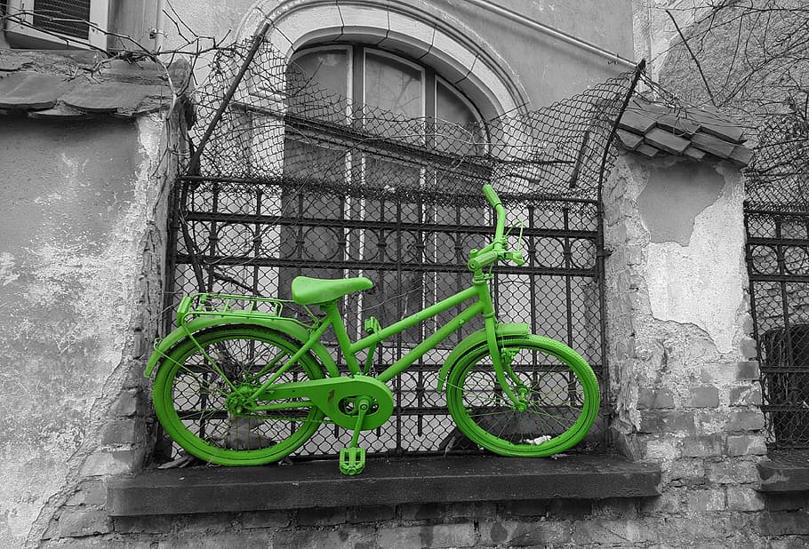 green commuter bicycle stuck on fence, vintage bike, old, retro