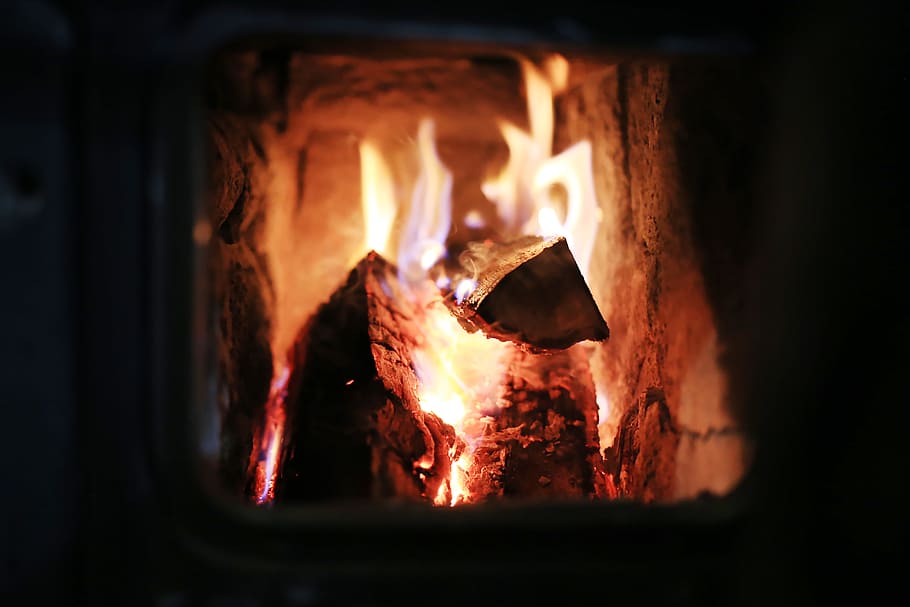 macro photography of wood burning, firewood being burned in fireplace HD wallpaper