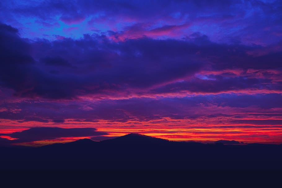 silhouette of mountain under cloudy sky during golden hour, untitled HD wallpaper