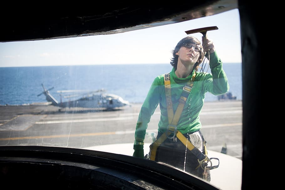 woman cleaning vehicle window, washing, navy, ship, military