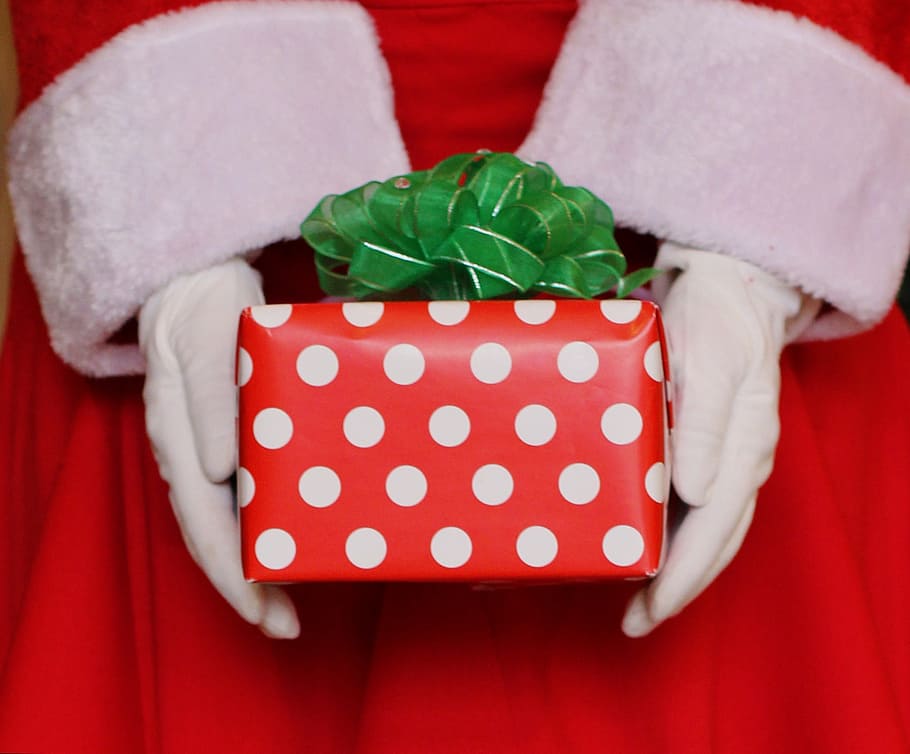 person holding red and white polka-dot gift box, santa, christmas present HD wallpaper