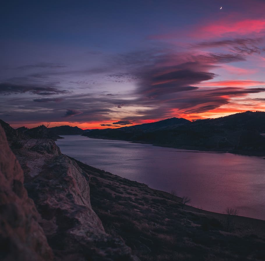 landscape photography of body of water near mountains, low light photo of calm body of water HD wallpaper