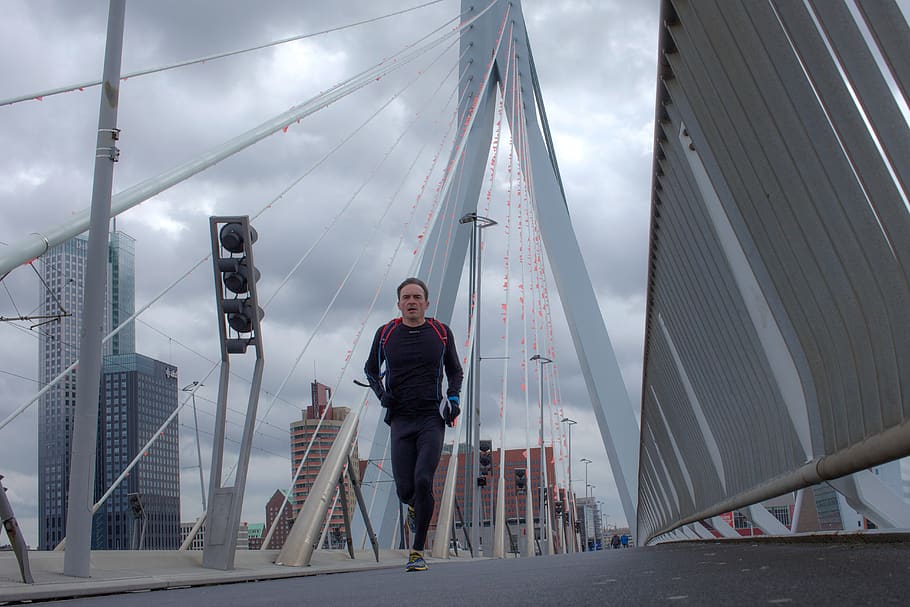 running, erasmus bridge, man, racing, architecture, built structure HD wallpaper
