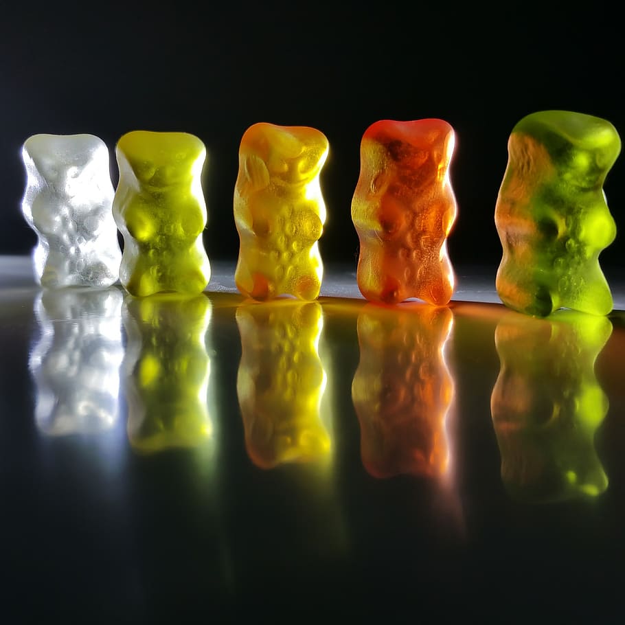 five assorted-color jelly candies, gummibärchen, gummi bears