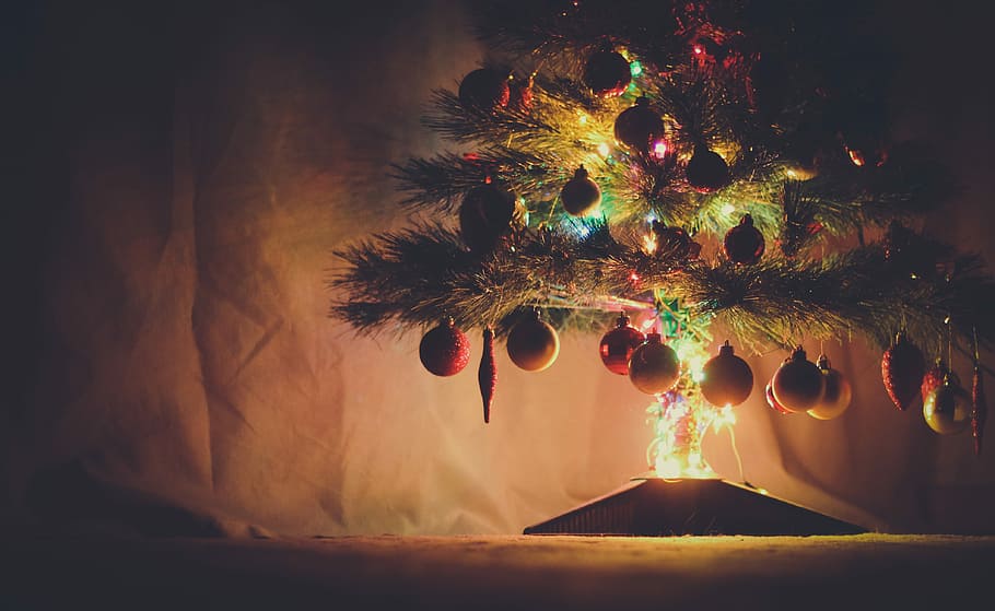 assorted-color bauble and string light, Christmas tree with baubles HD wallpaper