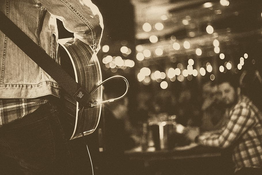 grayscale photo of person playing guitar on stage, grayscale photo of person playing guitar HD wallpaper