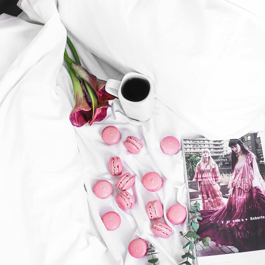 pink munchkins on white comforter, pink macaroons on white textile, HD wallpaper