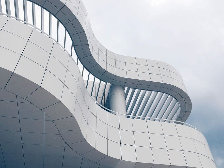 architectural photograph of concrete structure, low angle photography of curve building HD wallpaper