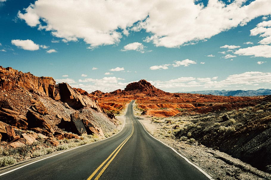 road under white and blue sky, road surrounded by mountains, highway HD wallpaper