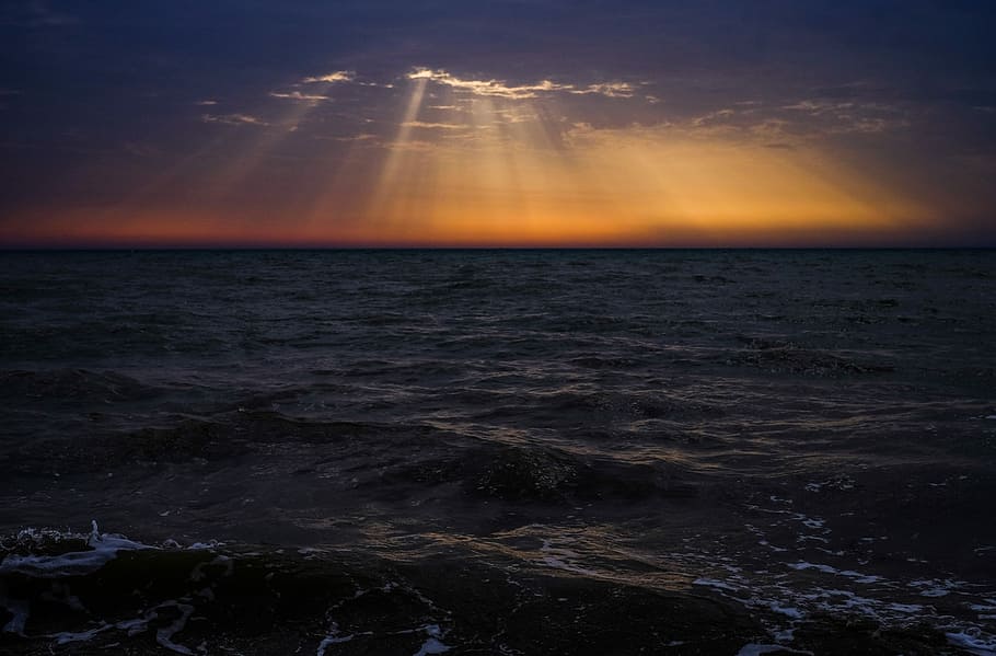 sun rays on body of water, aerial photography of body of water HD wallpaper