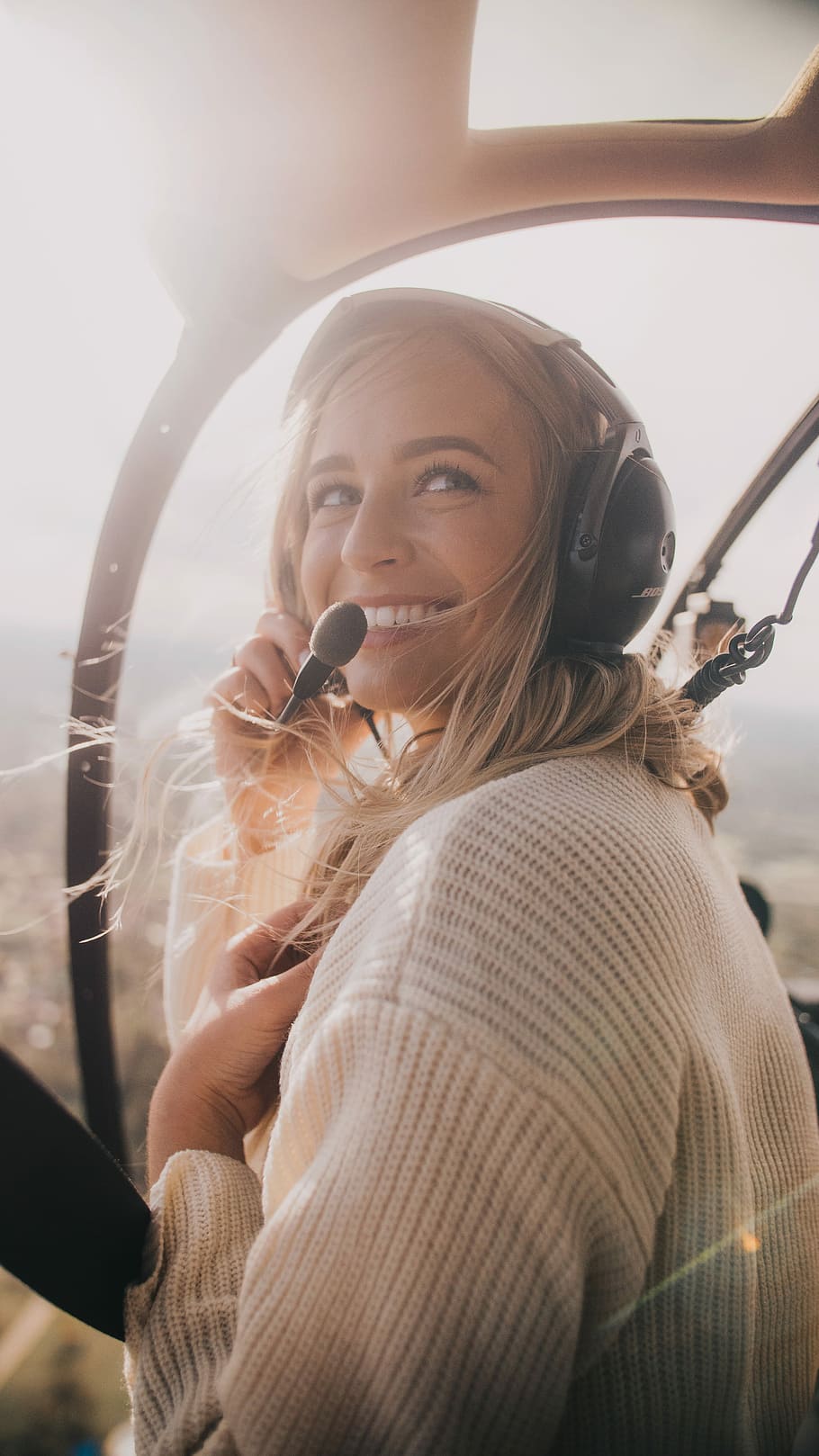 woman in white knit sweater inside aircraft, woman using headset inside the plane, HD wallpaper