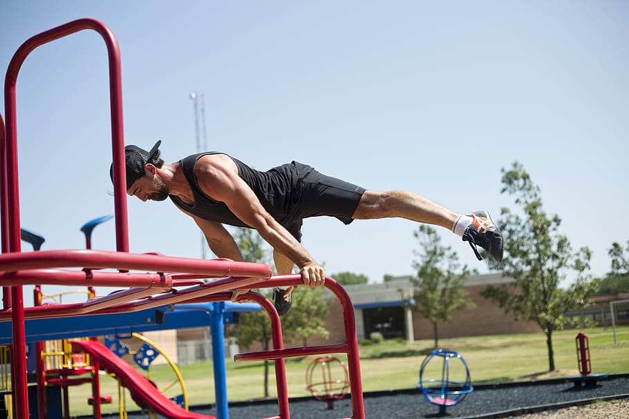Planche at the Playground, man exercising on red ladder, grip, HD wallpaper