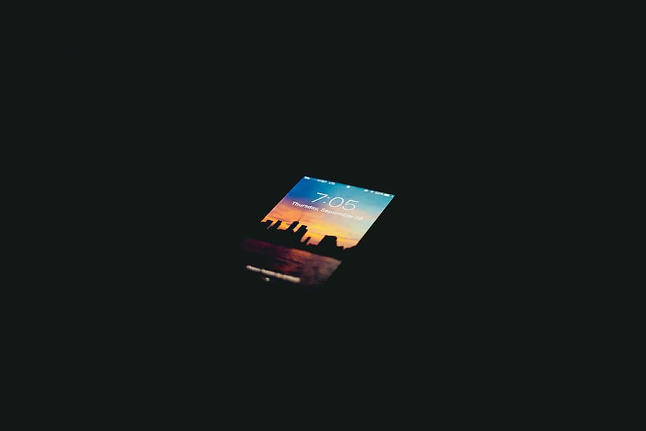 Enhance your iPhones Dark Mode with these wallpapers