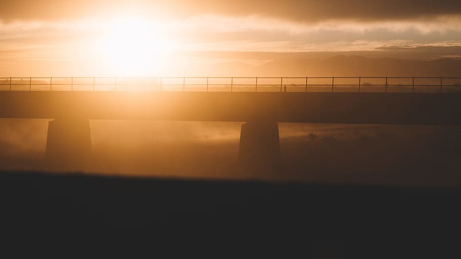 silhouette bridge during sunset, gray concrete bridge against light at sunset HD wallpaper