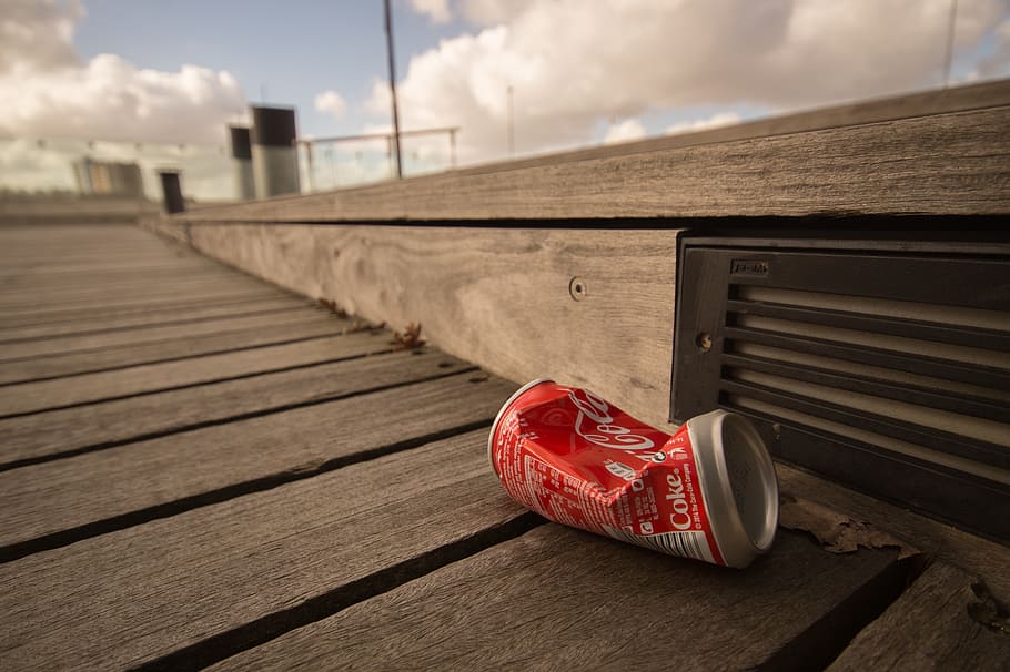 Coca-Cola soda can on brown wooden surface, garbage, cocacola HD wallpaper