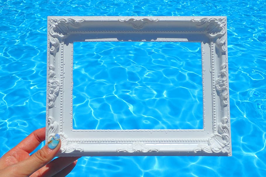 person holding rectangular ceramic flame near pool, swimming Pool HD wallpaper