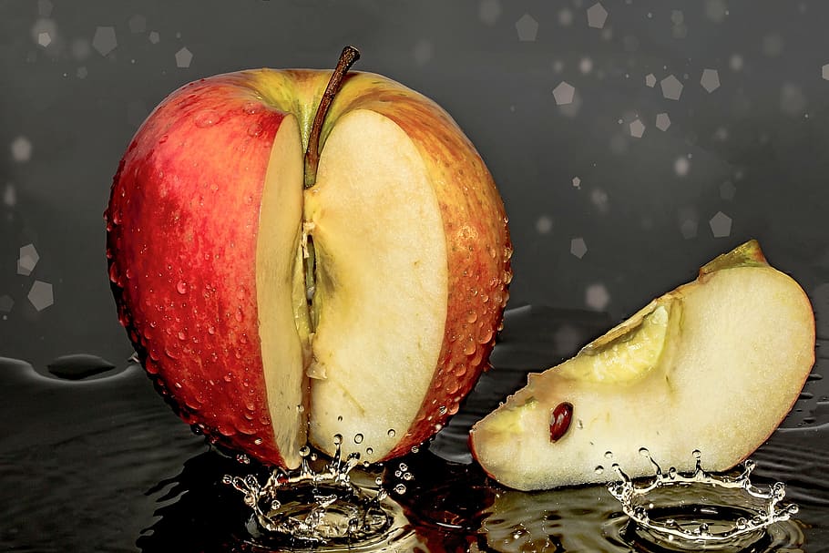 red slice of Apple with water drop, piece of apple, cut, drip