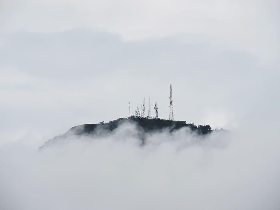 Radio towers on top of a cloud-shrouded mountain in Brazil, gray metal towers on top of mountain at daytime, HD wallpaper