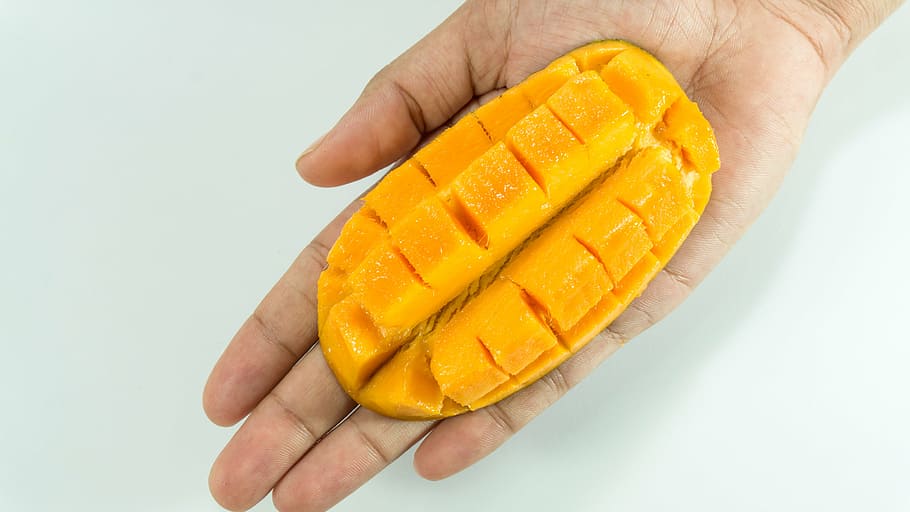mango, slice, on hand, yellow, isolated, cube, fruit, women HD wallpaper
