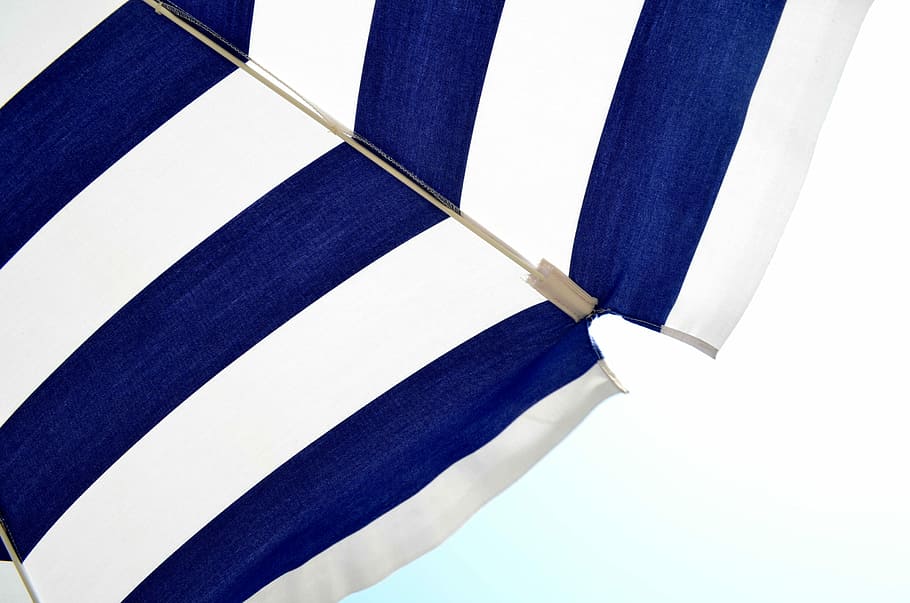 blue and white striped umbrella, closeup photo of white and blue stripe beach umbrella HD wallpaper
