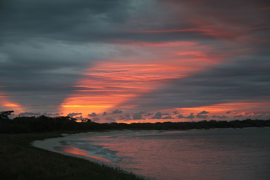 tapeworm, sunset, evening, down, sun's rays, dark, rainy, dramatic HD wallpaper
