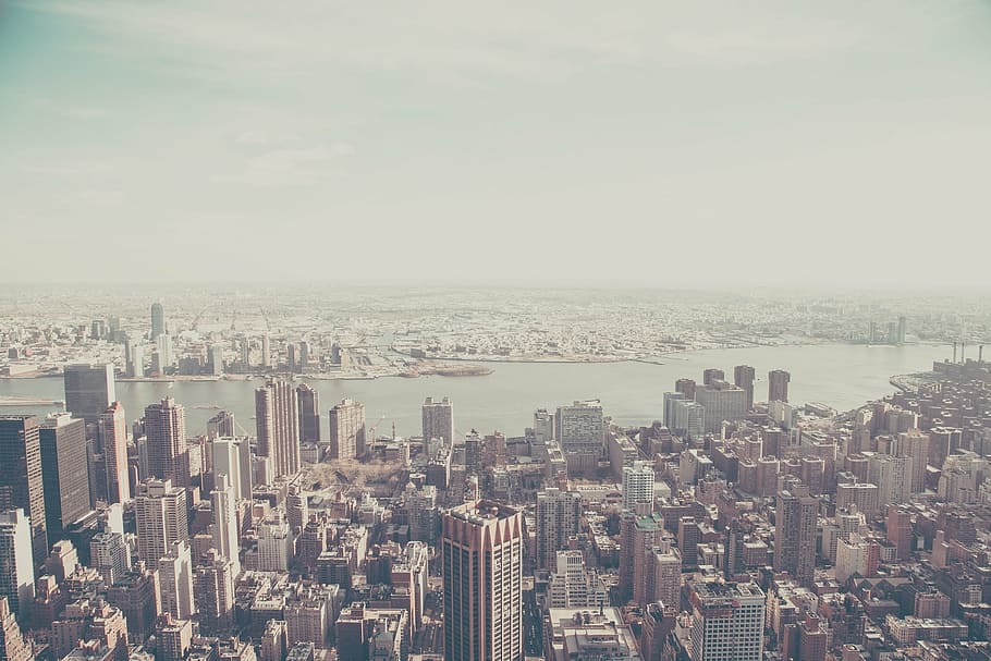 high angle photo of metropolis, buildings, aerial, view, rooftops HD wallpaper