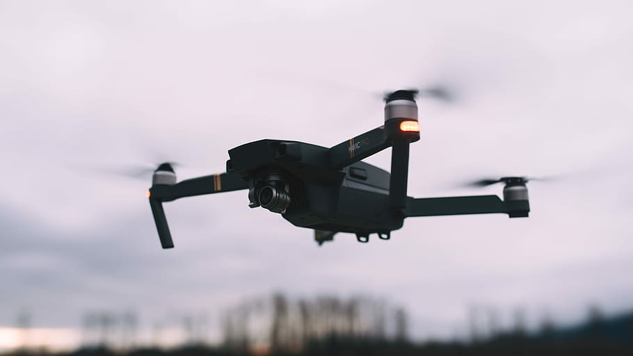 black quadcopter drone hovering in the air, black RC drone on mid air HD wallpaper