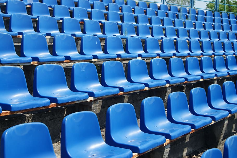 Tribune sports stadium with empty chairs Stock Photo - Alamy