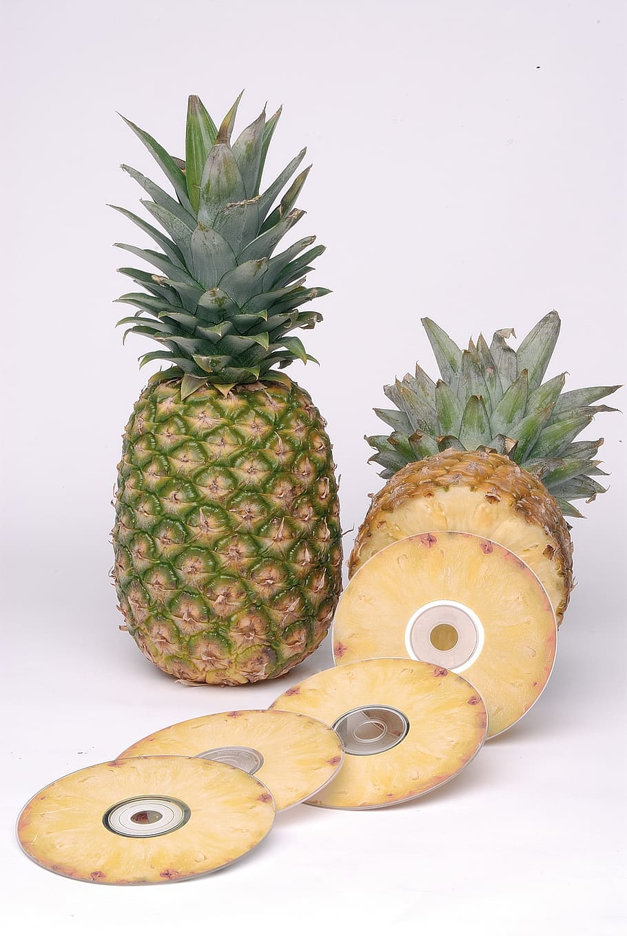 two pineapple fruits on white surface, still life, computer science HD wallpaper