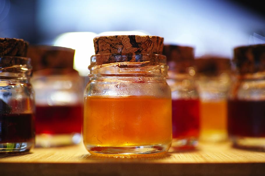 clear glass jar with orange liquid, jam, the jar, macro, color HD wallpaper