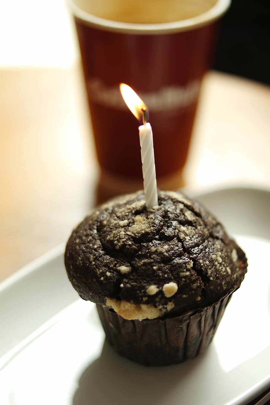 chocolate cupcake with lighted candle on top, coffee, burning HD wallpaper