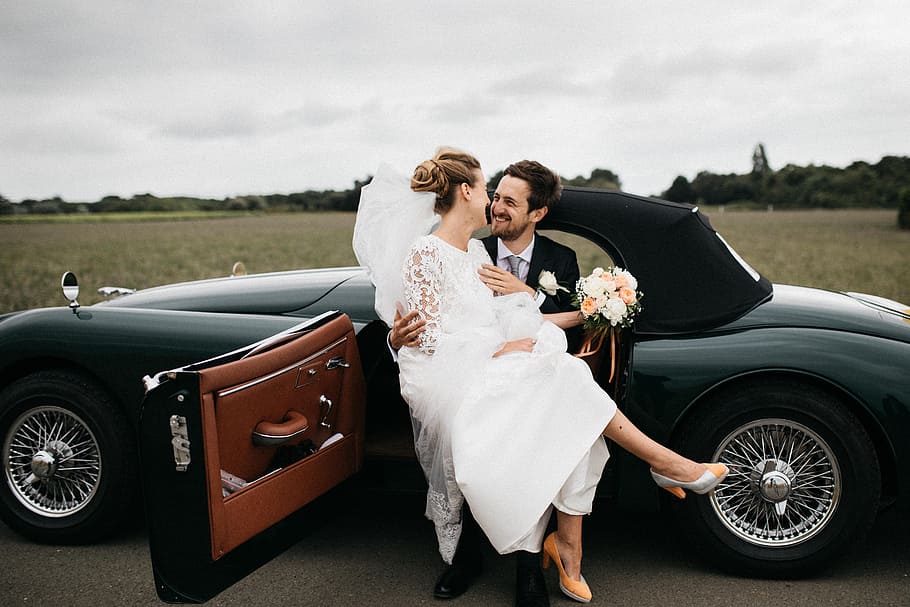 newly weds on black coupe during daytime, bride, car, wedding