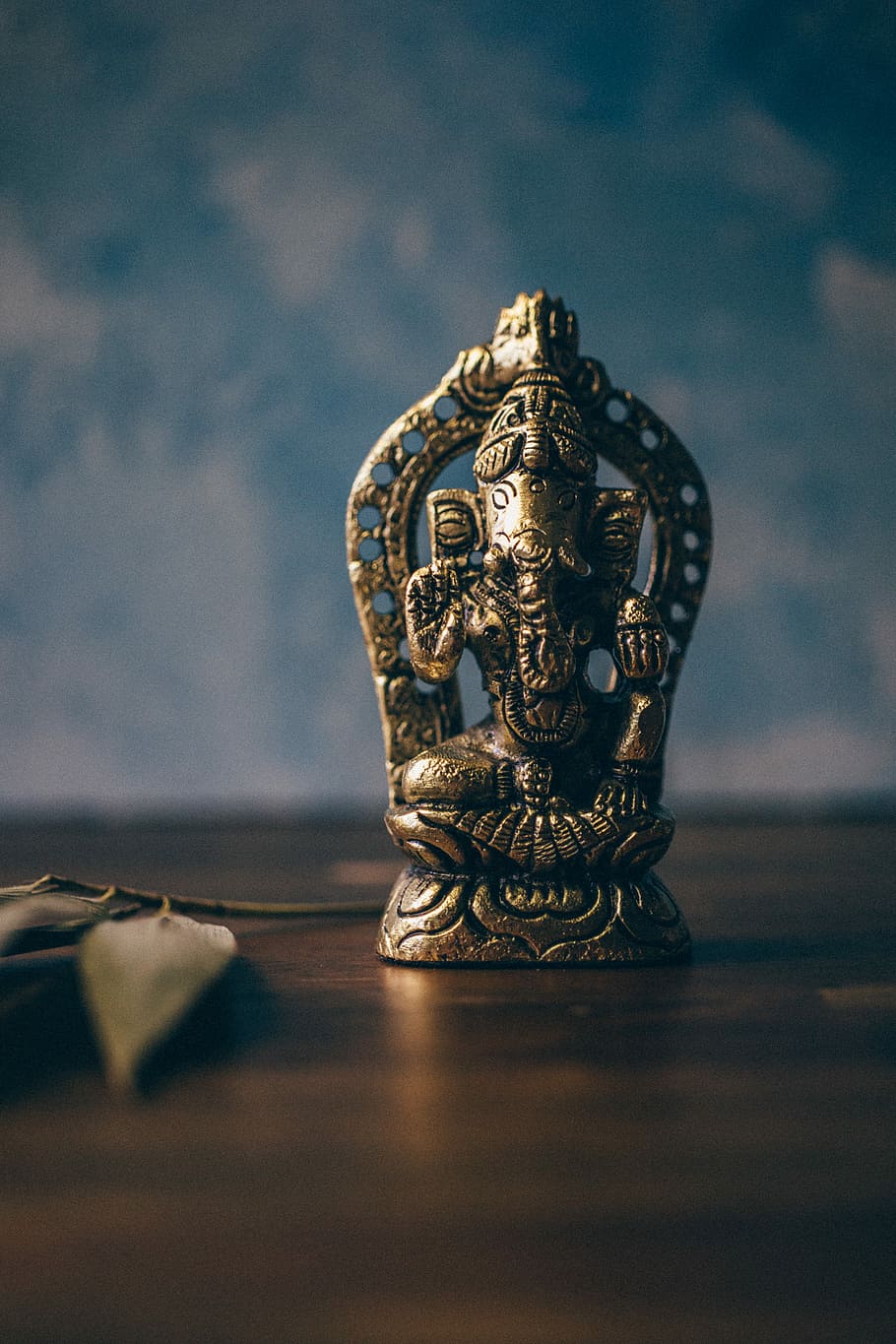 HD wallpaper: Ganesha figurine on brown surface, shallow focus ...