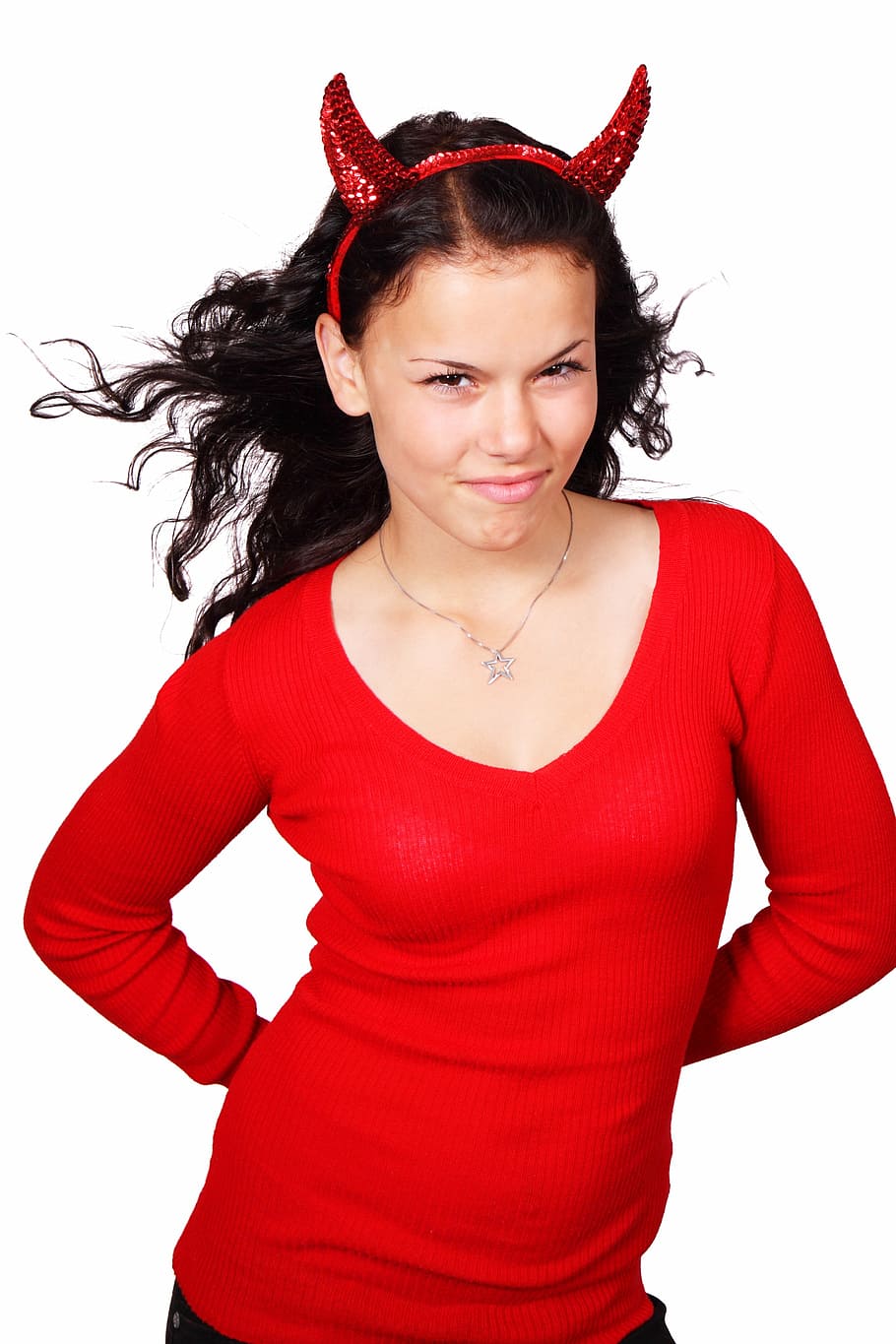 woman wearing devil headband and v-neck shirt, costume, angry