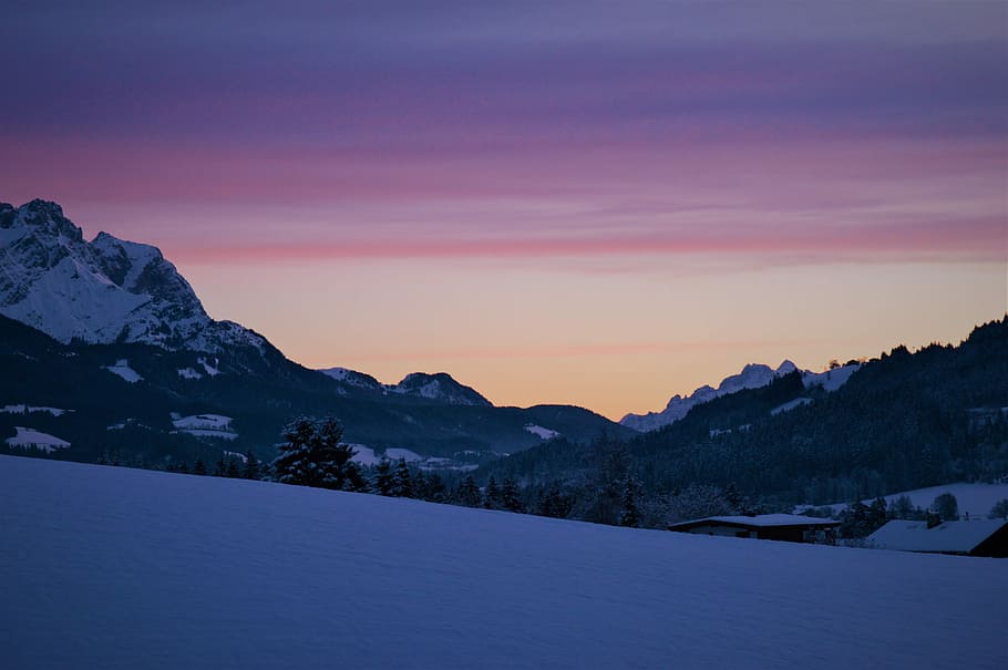 mountain range covered with snows, snow terrain under cloudy sky during daytime HD wallpaper