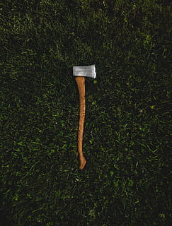 brown and silver pickaxe, brown wooden handled ax on green grass field HD wallpaper