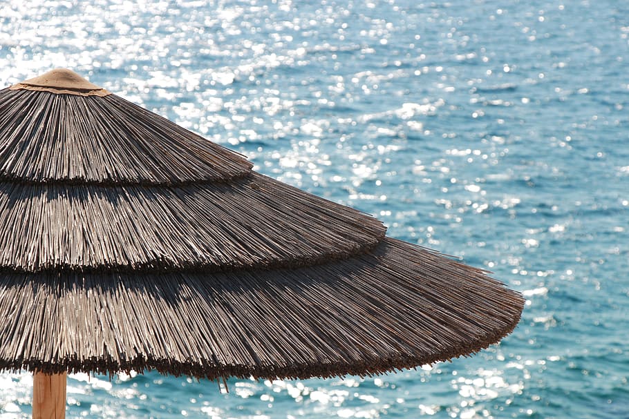 parasol, summer, sea, water, roof, thatched roof, no people HD wallpaper