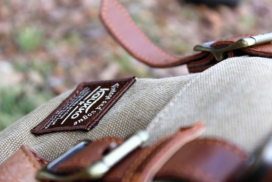 Journey Awaits, gray and brown bag, close up, patch, outdoor HD wallpaper