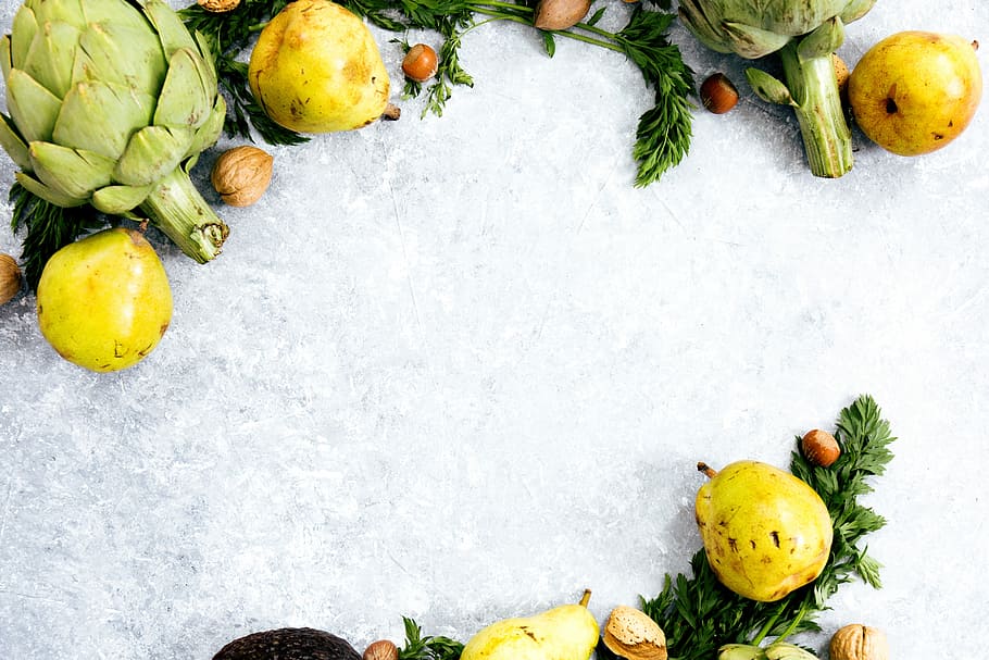 yellow fruits on ice, yellow fruits on white surface, pear, artichoke HD wallpaper